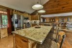 Fully equipped kitchen on the main level with bar seating